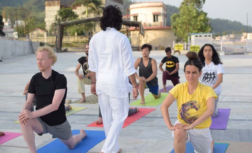 Teacher guiding an advanced student during the 300 hour course