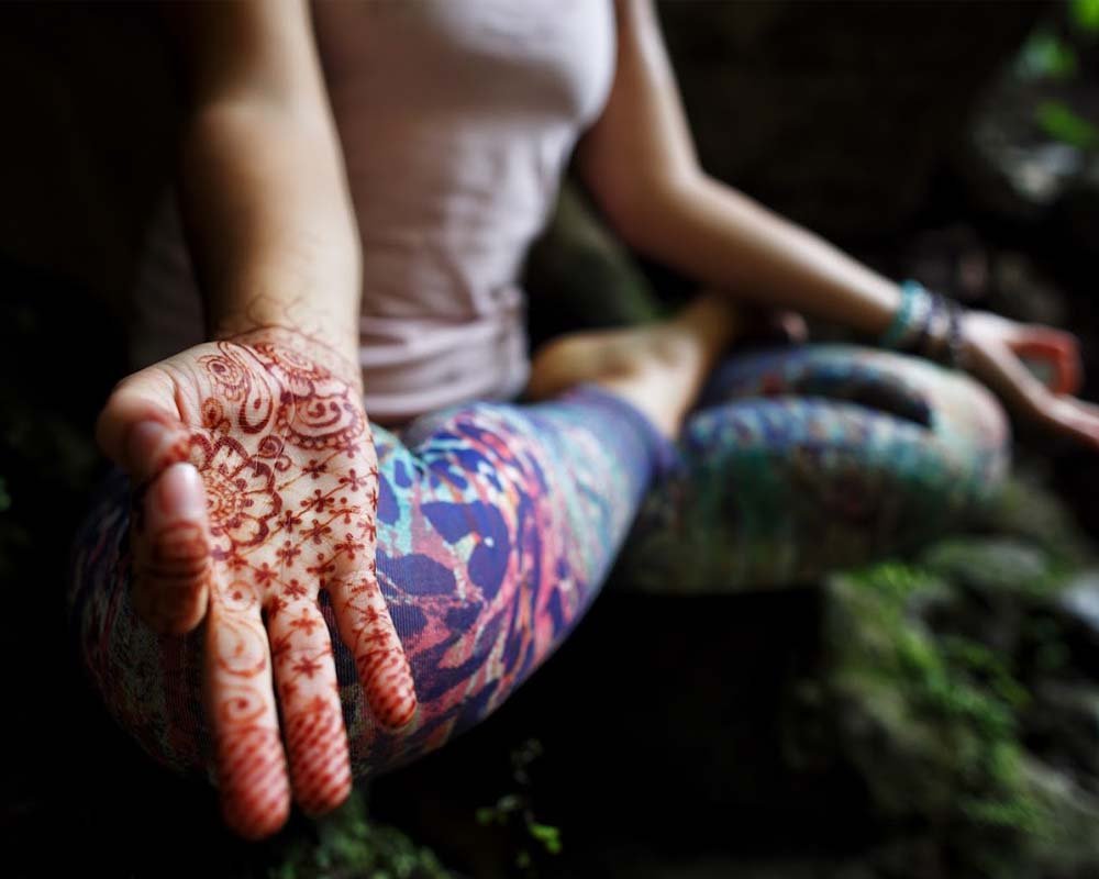 Kundalini yoga practice by the Ganga in Rishikesh