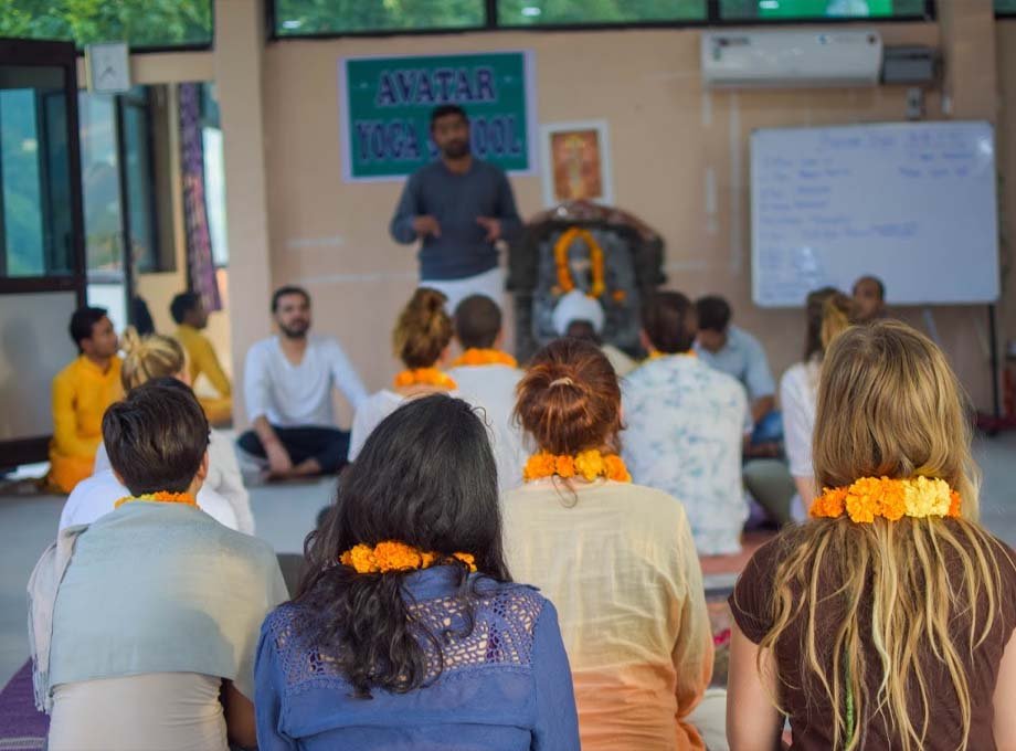 Pranayama breathing practice by the Ganga in Rishikesh