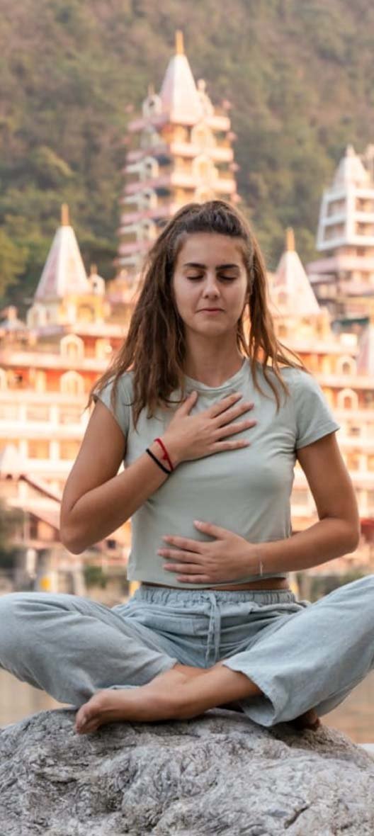 Students practising pranayama and meditation at Avatar Yoga School in Rishikesh