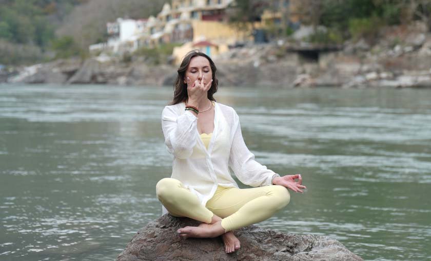 Teacher guiding a student through a gentle breathing practice